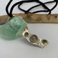 Geometric, abstract design. Sterling Silver Rutile Quartz Green Tourmaline Pendant Necklace. Handmade and one of a kind designer jewelry. Made in Colorado. 